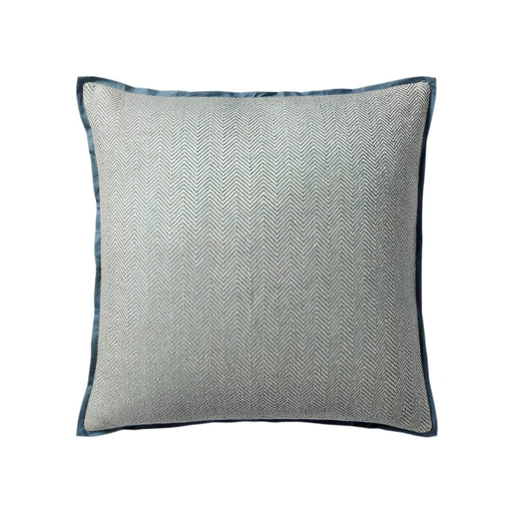 Coussin passepoilé cousu à la main